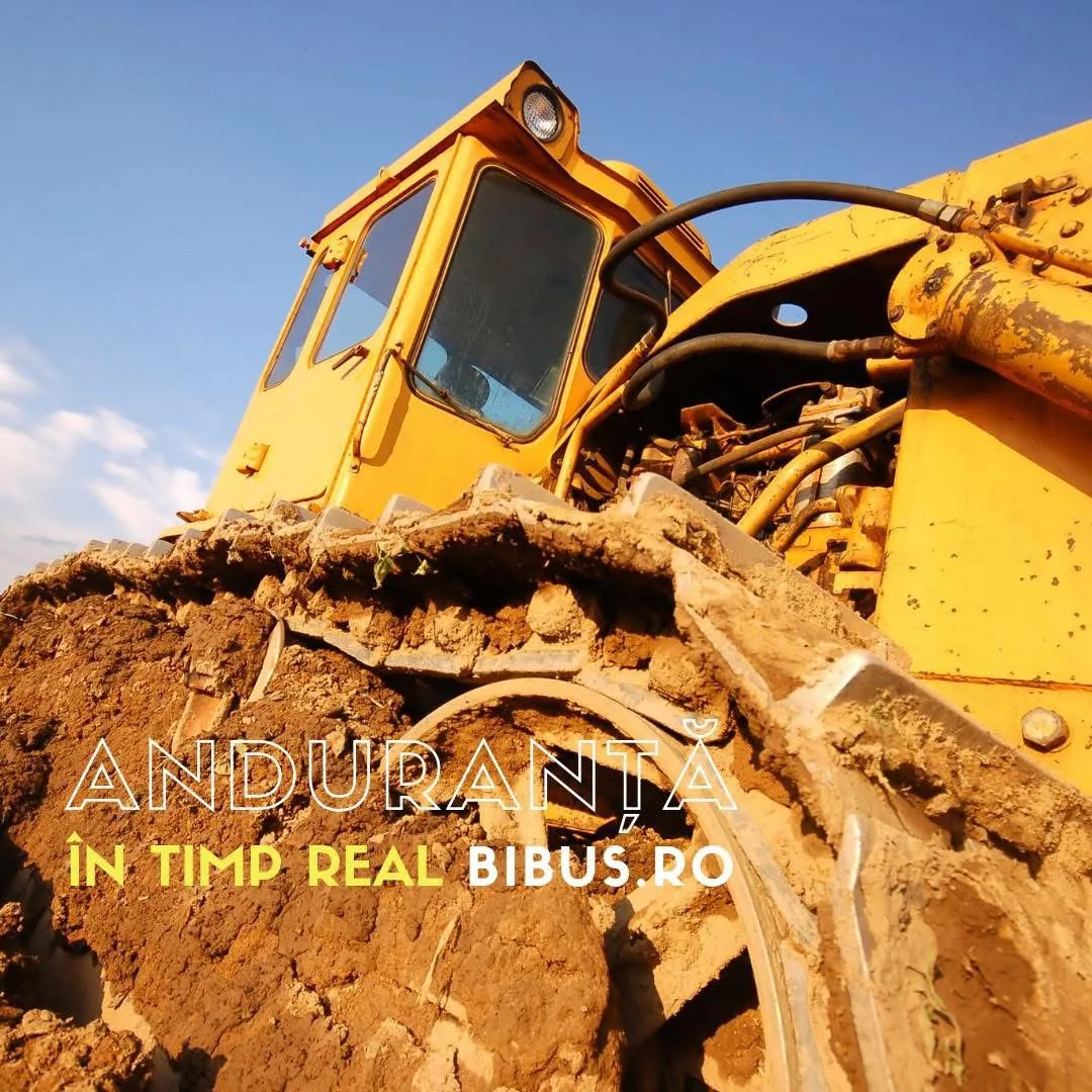 Buldozer galben văzut din unghi jos, cu textul „Anduranță în timp real · BIBUS.RO”